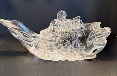 Mythical fish in rock crystal with a child on its back - China late 19th century
